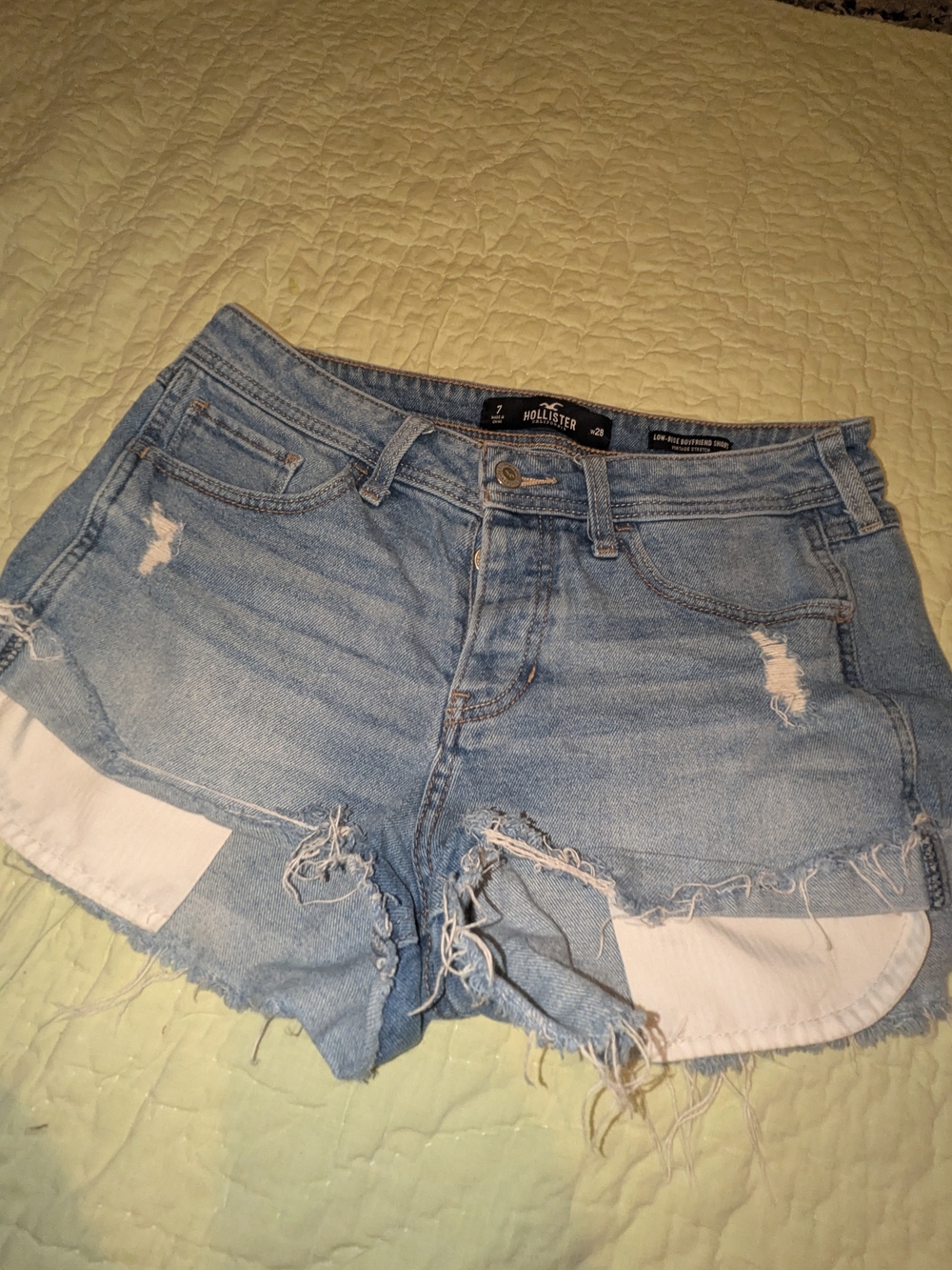Hollister Light Wash Distressed Denim Shorts with White Pocket Trim